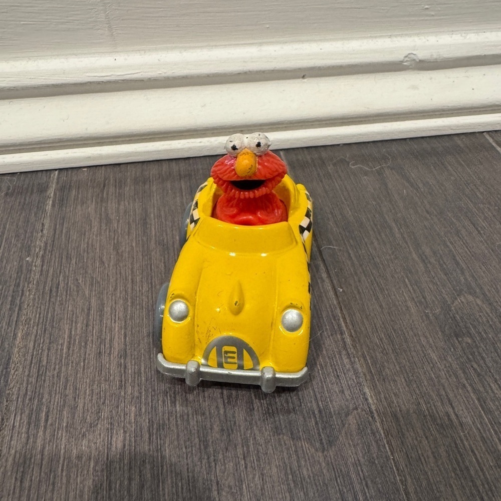 Vintage Sesame Street Metal Yellow Elmo Vehicle Car